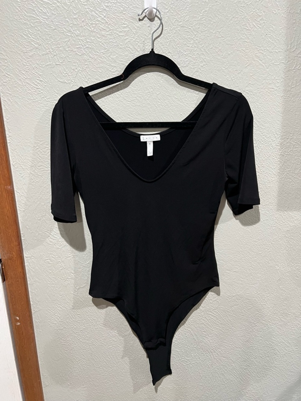 Leith Black V-Neck Short Sleeve Bodysuit Great Quality and Flattering Fit Size M
